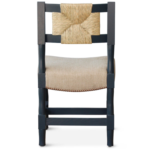 This New York Athletic Club dining side chair is a 40s twist on an arts & crafts classic: a re-edition by Peter Dunham for Hollywood at Home of a chair from the Downtown New York Athletic Club. Remarkably comfortable, the chair is crafted from hand-turned solid oak and handwoven rush.