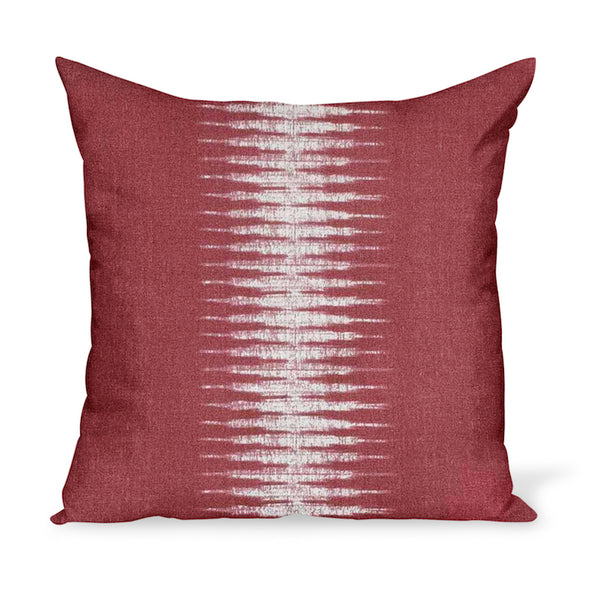 A linen pillow made from a modern take on Ikat in Pomegranate, a red colorway, by Peter Dunham Textiles