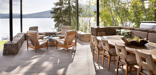 A beautiful outdoor dining scene showcasing the How to Marry a Millionaire dining chairs.