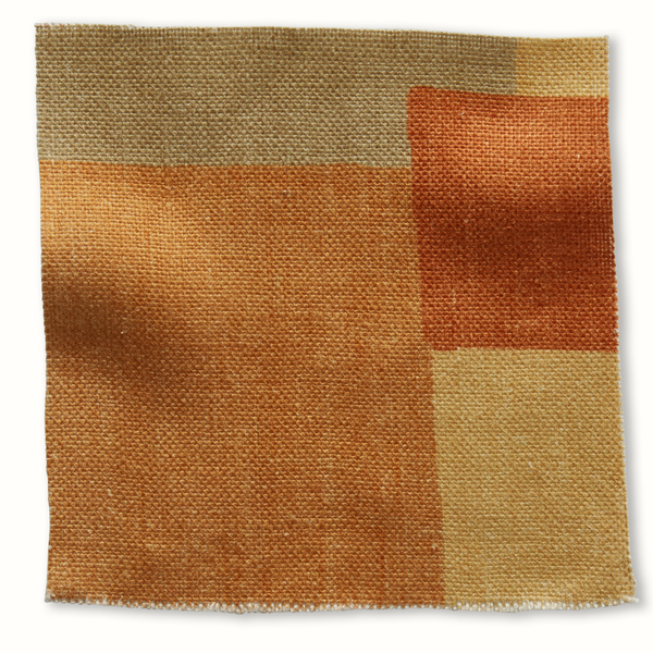 Orange and yellow patchwork pillow fabric with textured woven collage pattern
