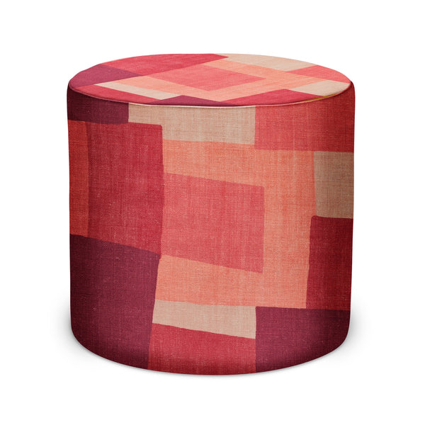 Round indoor pouf in coral/pink/red patchwork geometric fabric