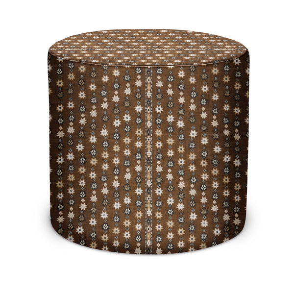 Round indoor pouf with brown fabric and white star pattern