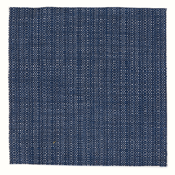 Indigo woven canvas pillow with textured grid pattern