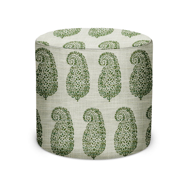 Round indoor/outdoor pouf with green on white paisley textile pattern, padded seat.