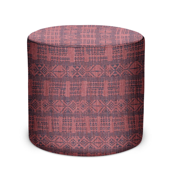 Cylindrical upholstered indoor pouf in burgundy geometric pattern fabric