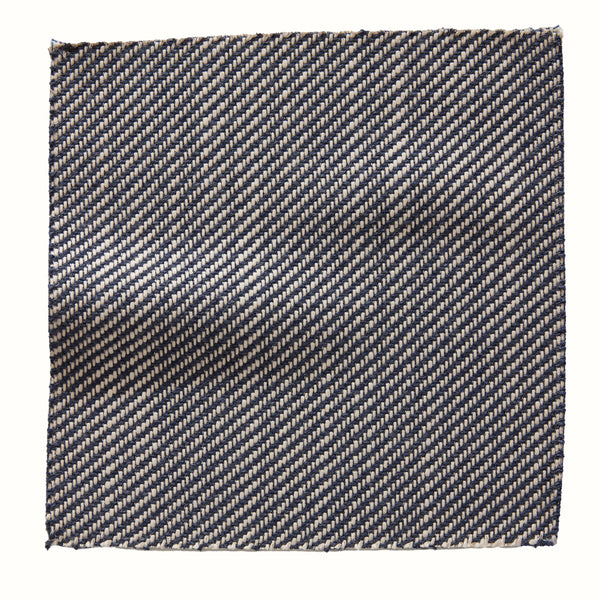 Indigo and white woven pillow cover with herringbone pattern