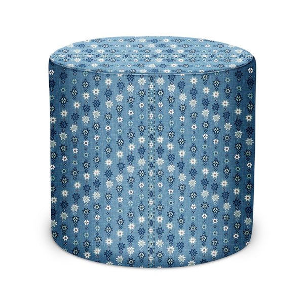 Blue geometric-pattern indoor pouf with round top and cylindrical sides