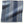 Indigo blue dhurrie rug with vertical stripe pattern and textured woven surface