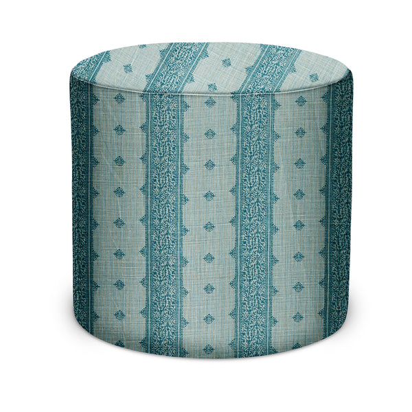 Blue patterned cylindrical indoor pouf with vertical stripe and medallion print