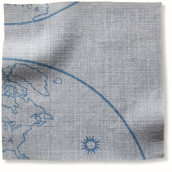 Mist-blue globe patterned pillow cover with blue map and curved line details