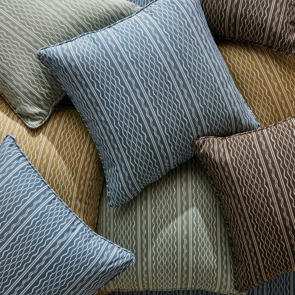 Outdoor Hmong stripe pillow covers in sage and blue tones, stacked