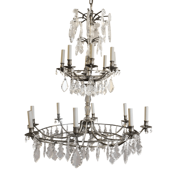 Antique bronze crystal chandelier with curved arms, candle-style bulbs, and clear hanging drops