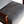 Wooden armchair seat cushion in light blue with angled armrest