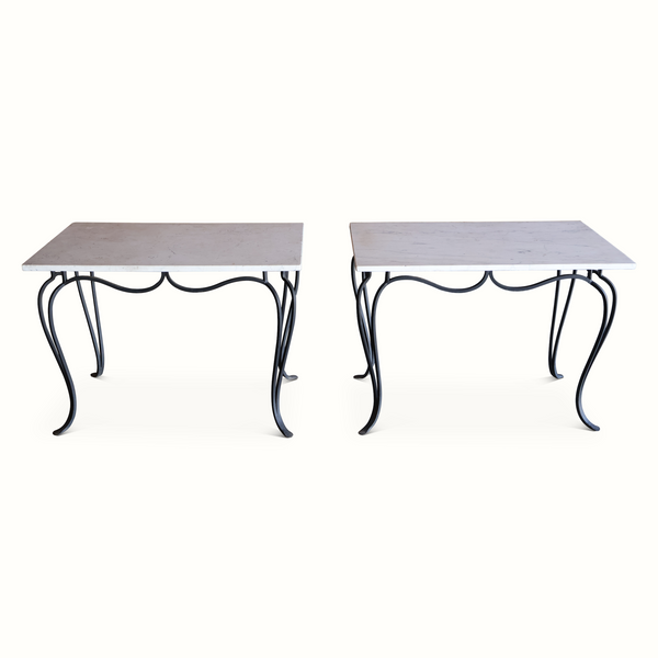 Pair of marble tables with wrought iron scrollwork legs and rectangular tops