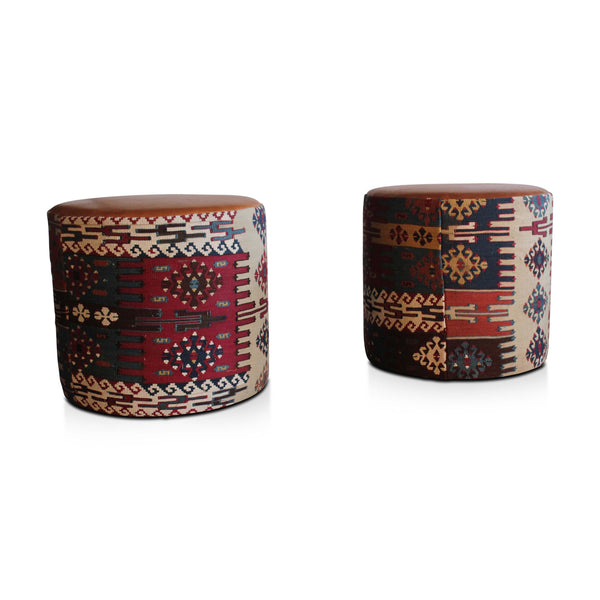 Round kilim pouf with colorful geometric print and tan leather-look top