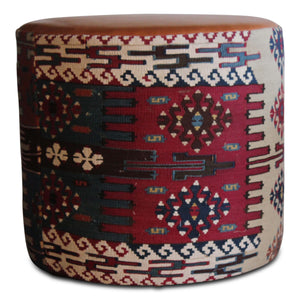 Round kilim pouf with multicolor geometric pattern and tan leather-look top