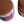 Close-up of tan leather-look top and kilim side pattern on round pouf
