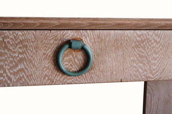 Cerused oak console drawer front with teal ring handle