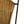 Wicker chair back close-up showing woven texture and dark iron support