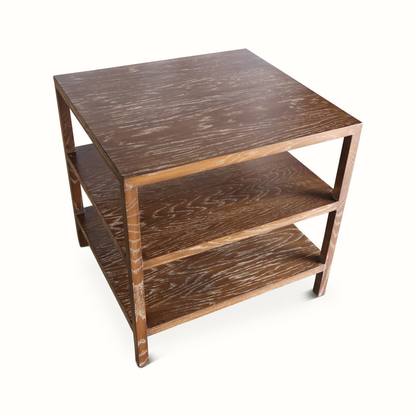 Tiered table with two shelves and angled legs, distressed brown wood grain