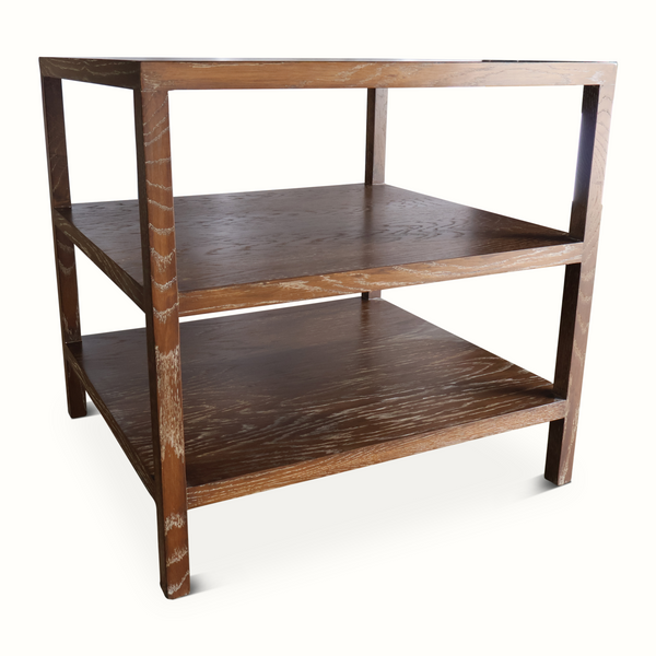 Tiered table with two open shelves and sturdy legs, distressed brown finish