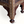 Inlaid Moorish stool base detail with carved panels, geometric inlay, and turned legs