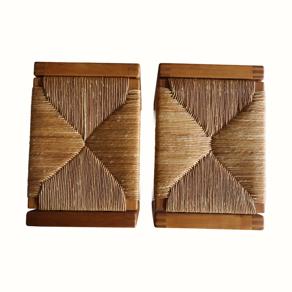 Square woven rush seat panels on wooden stools, with braided diamond pattern