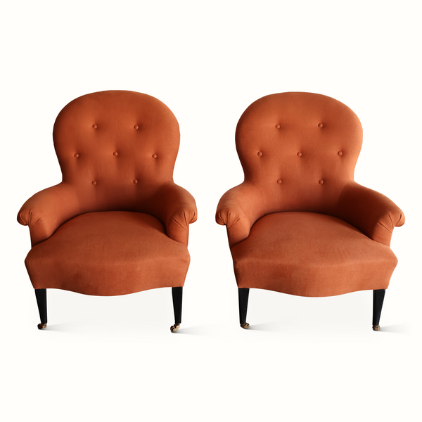 Set of two Napoleon III armchairs in terracotta with button-tufted backs and armrests