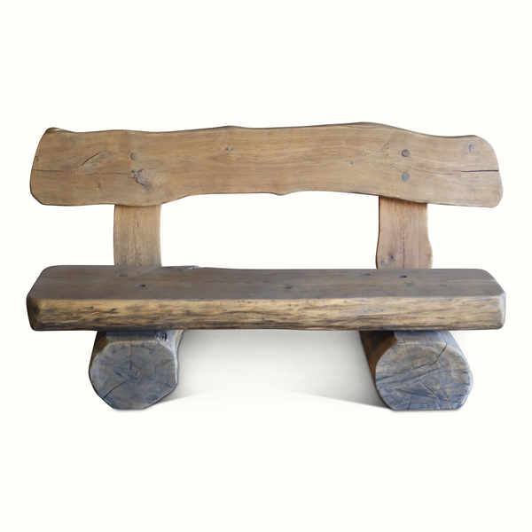 Live-edge wooden bench with thick seat and blue-stained log legs showing end grain