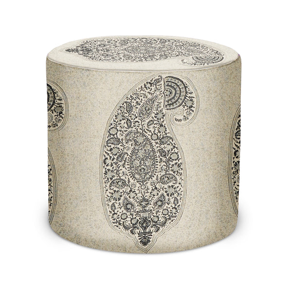 Round upholstered pouf with beige fabric and dark paisley medallion print, fabric top