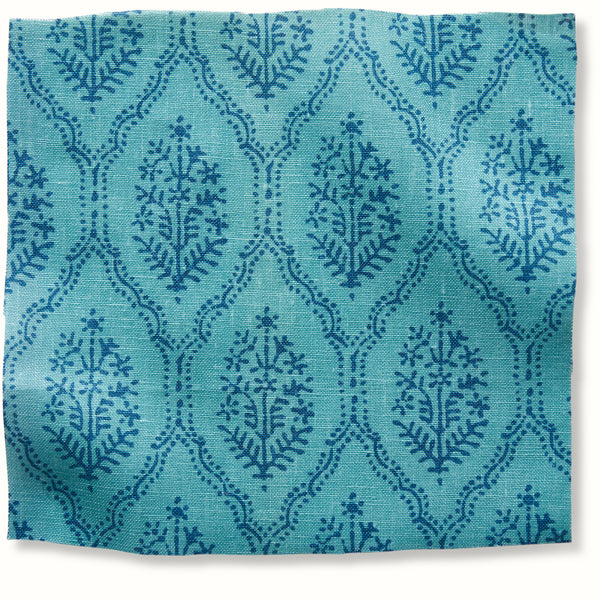 Blue patterned pillow cover with trellis and floral motifs, rectangular