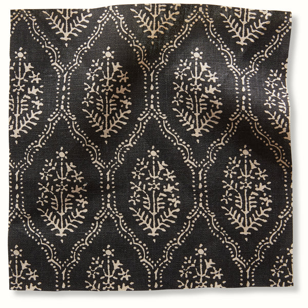 Onyx pillow cover featuring beige jaali lattice pattern on dark fabric