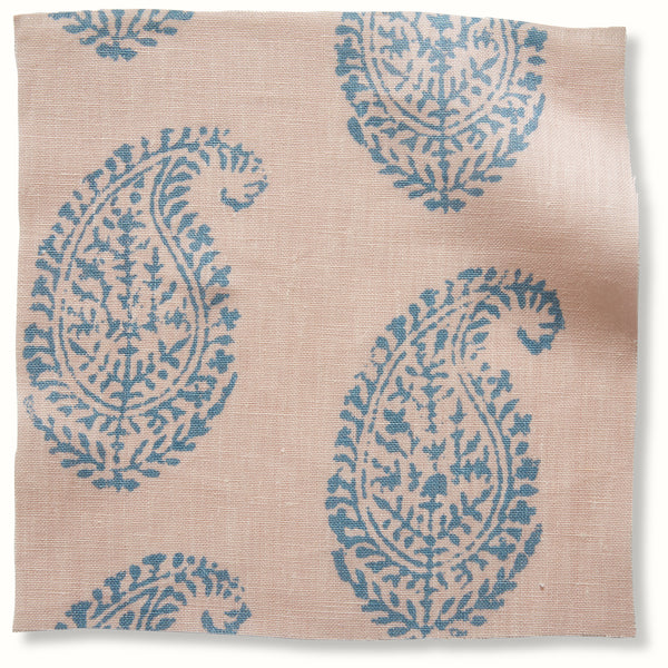 Paisley patterned pillow cover fabric in light pink with blue motifs