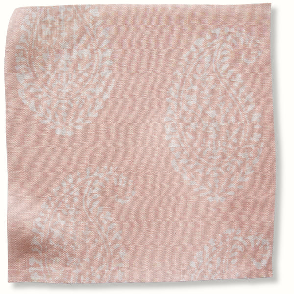 Pink pillow cover fabric with white paisley pattern