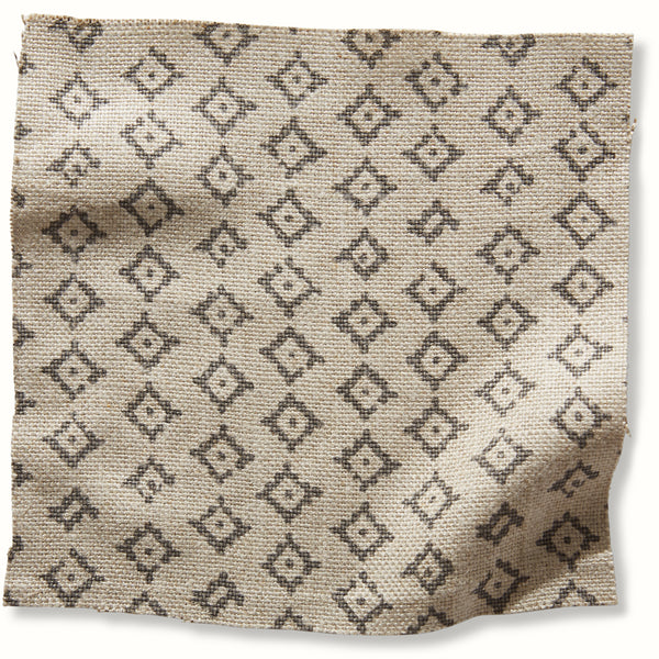 Patterned decorative pillow cover in natural beige with dark geometric motifs