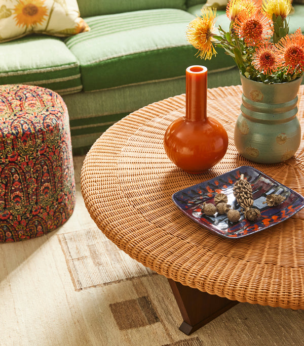 Kyoto round rattan coffee table with tapered legs and circular woven top