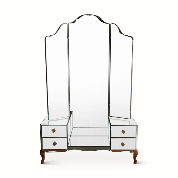 Mirrored vanity table with three glass mirror panels and two drawer cabinet bases