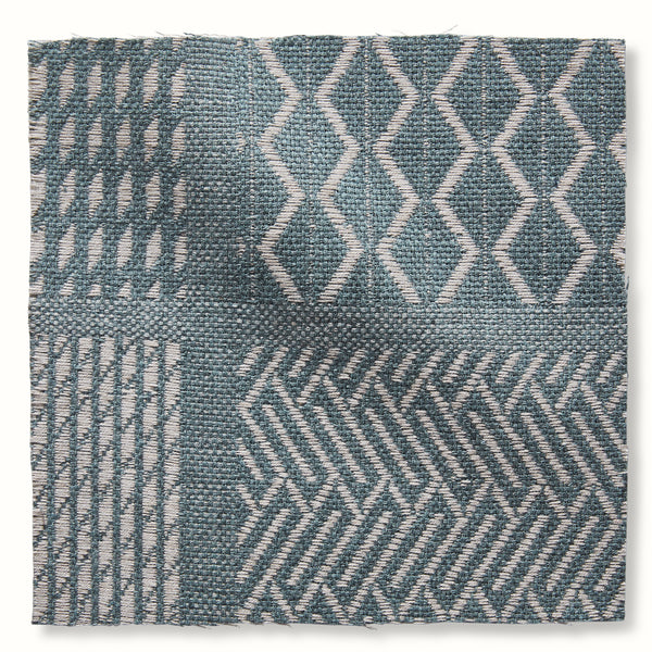 Outdoor lagoon throw pillow cover with teal geometric tribal pattern, square