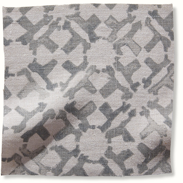 Geometric diamond-pattern square pillow cover in gray and white, textured woven fabric