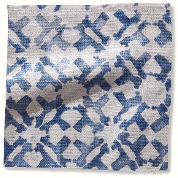 Indigo-and-white geometric patterned fabric pillow cover