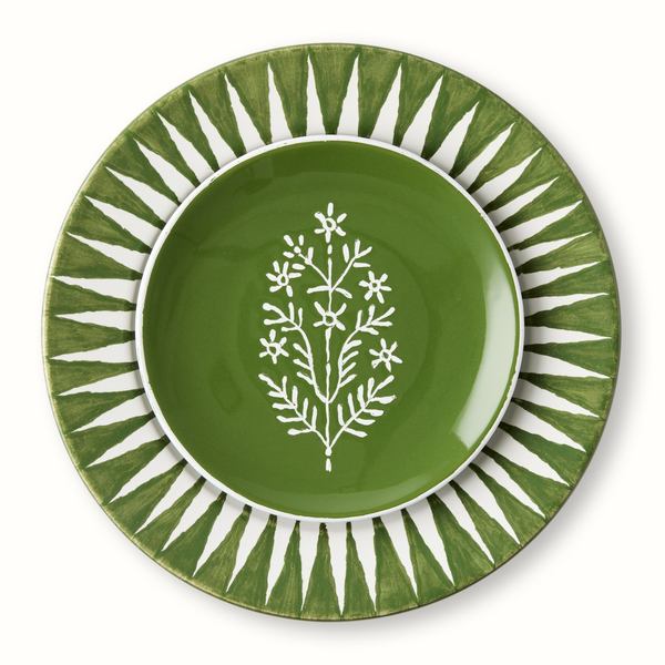 Olive green appetizer plate with white tree branch design, centered on ridged outer ring