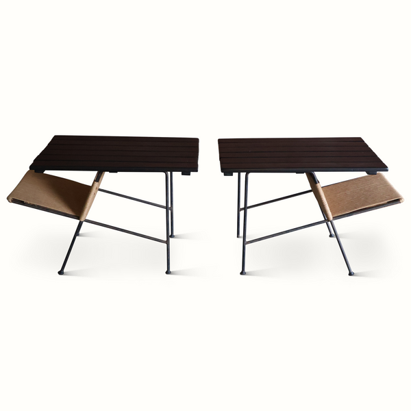 Pair of slat iron side tables with dark slatted tops and tan woven side shelves