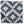 Indigo and white geometric pillow cover with star-like pattern