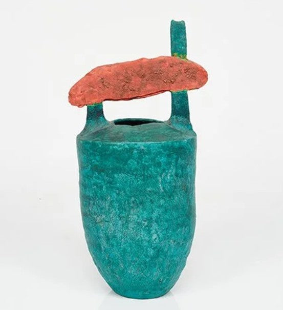 Ceramic vessel sculpture with turquoise teal body and red curved top detail.
