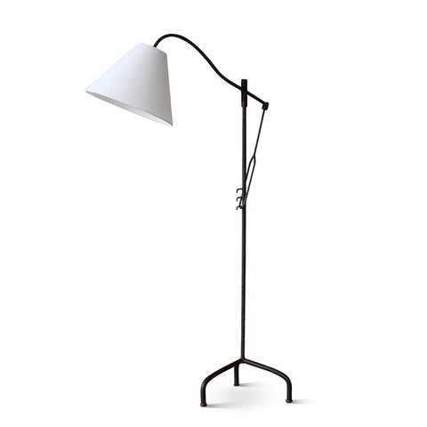 A black metal-based floor lamp with adjustable height shade.