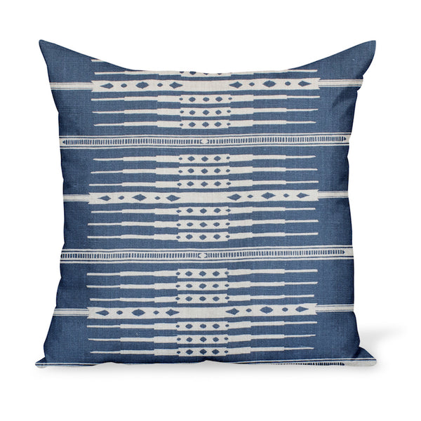 A decorative cushion made from Peter Dunham Textiles' linen print Tangiers in Indigo blue. A tribal yet pretty fabric available as pillows in a variety of sizes!