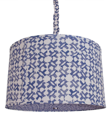 Our Upholstered Hanging Shade is available in both small and large sizes and include a flat welt detail along the top and bottom, as well as vertical welts every 18".  Includes an Antique Brass ceiling mount, 6' long chain, and fabric chain cover.  This item is available COM for easy customization, and can be made in custom sizes upon request.