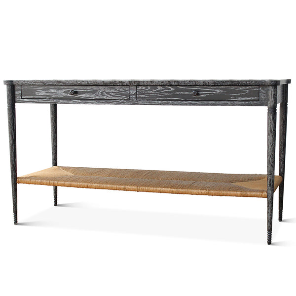 Black console table with two drawers and a woven tan paper rush shelf.