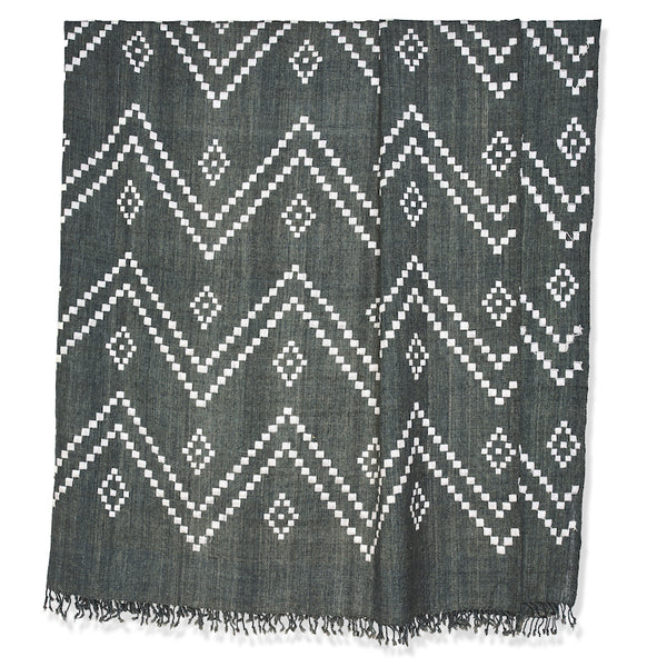Charcoal Zig Zag Indian bedcover featuring white chevrons, diamond accents, and fringe