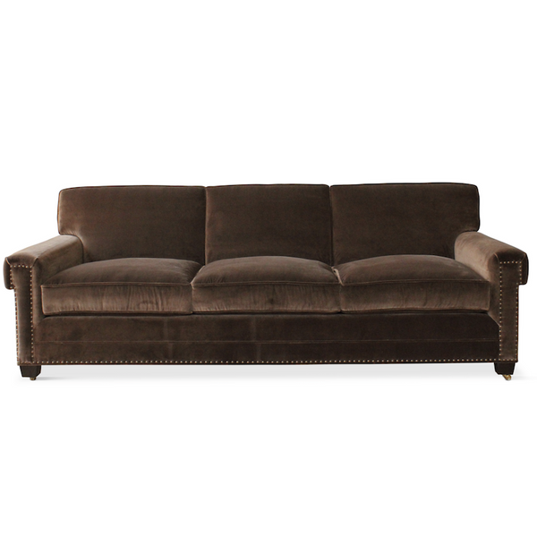 A customizable sofa with nailhead detail, designed by Peter Dunham for hollywood at Home, handmade in Los Angeles.